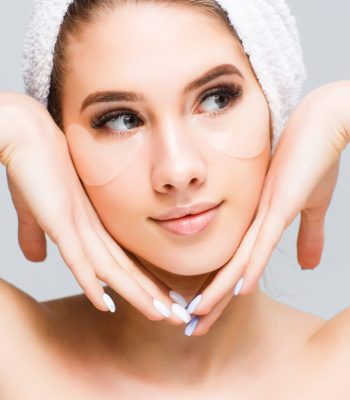 Skin care routine. Beautiful young woman face with white towel on her head. Fashion woman with bath towel. Spa beauty concept!