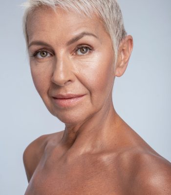 Close up of an attractive woman posing nude